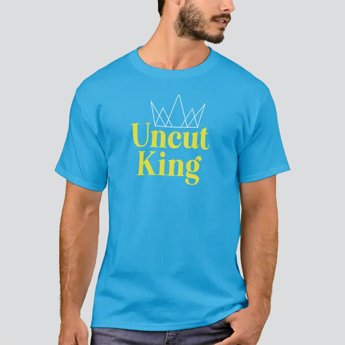 Blue shirt that says 'Uncut King' with a crown